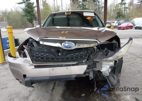 2014 Subaru Forester 2.5I Touring z USA, uszkodzony, nr VIN JF2SJAMCXEH409262